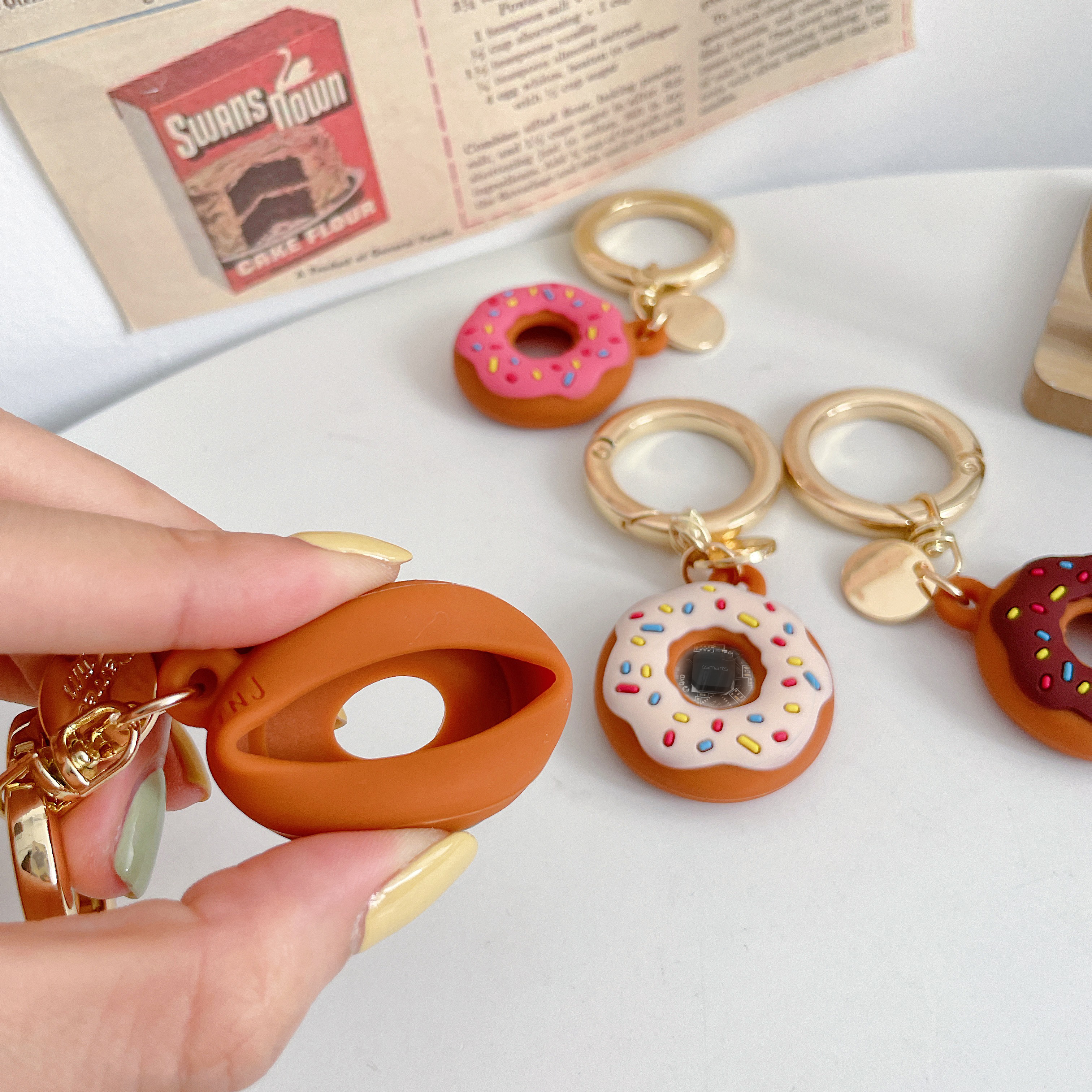 Donut-förmige Silikonhüllen für AirTags mit Schlüsselring – süßes Design für unterwegs