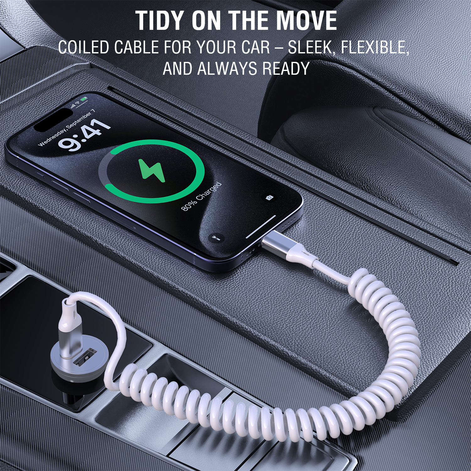 USB-C coiled cable in the car, tidy and flexible for on-the-go charging.
