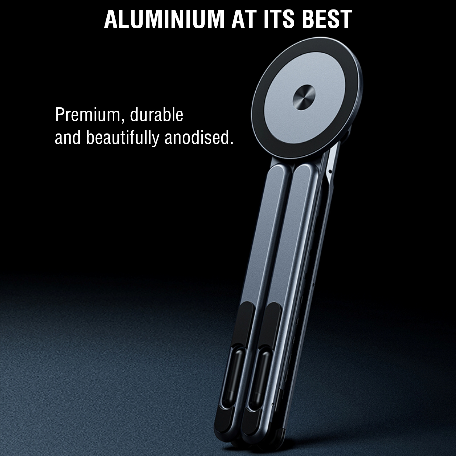he folded aluminium stand on a dark background – showcasing its elegant anodised finish.