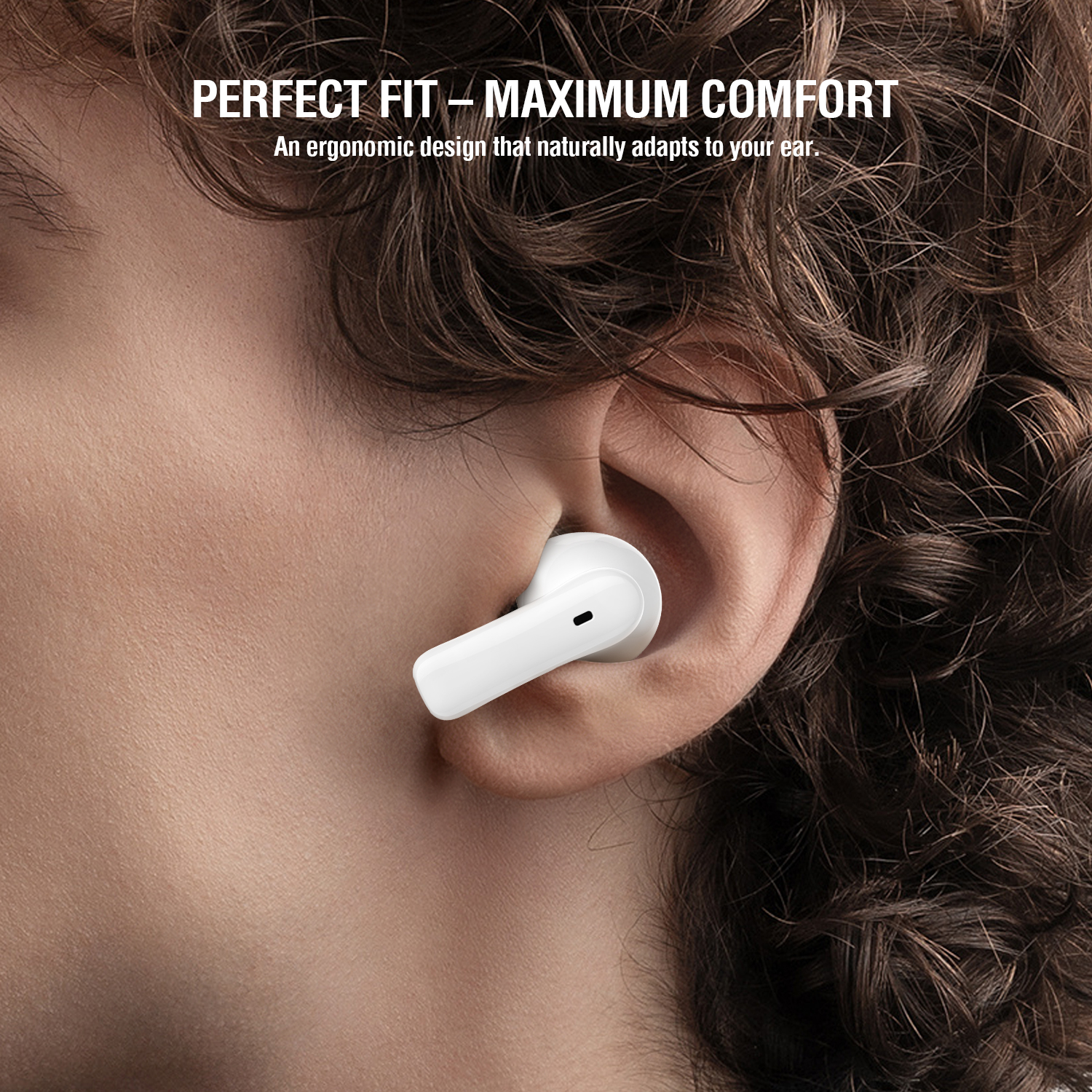 Close-up of an ear wearing a white 4smarts SkyBuds Air earbud.